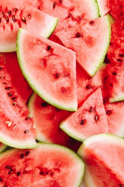 Olgun karpuz dilimlerinin arka planı. Üst Manzara. Kapat.