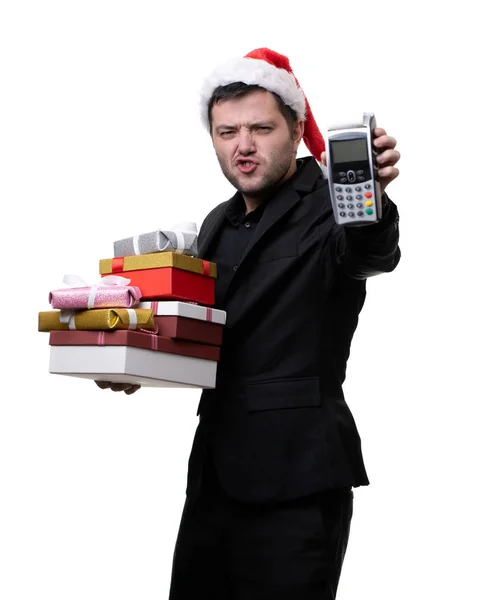 Santa şapka hediye kutuları ile ciddi adam elinde terminal ile görüntü — Stok fotoğraf