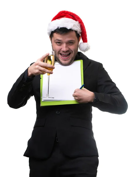 Obraz człowieka w Santa hat z kieliszka do szampana i czystej kartce papieru w ręce — Zdjęcie stockowe
