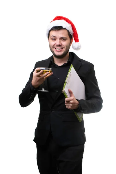 Obraz człowieka w Santas WPR, z karmelu trzciny w ustach, z szampanem, folder z pusty arkusz w ręce. — Zdjęcie stockowe