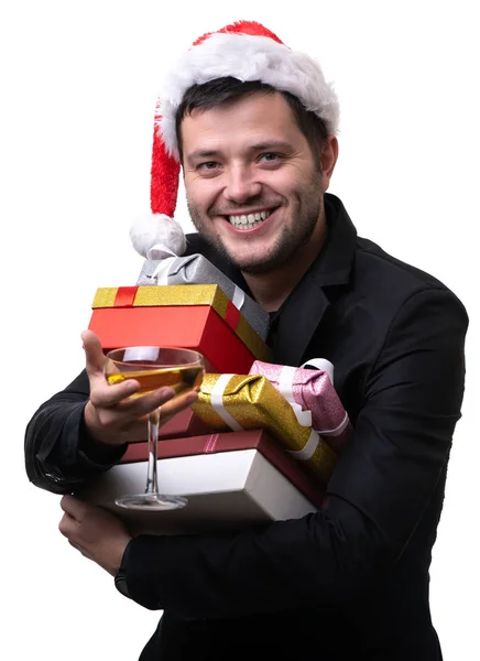 Foto de hombre feliz en gorra de Santas con cajas con regalos, con terminal — Foto de Stock