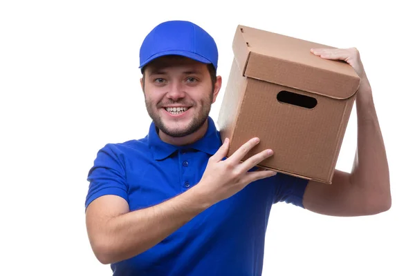 身穿蓝色 t恤及棒球帽及纸板箱的男子形象 — 图库照片