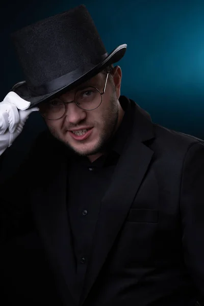 Photo of happy man in black hat in white gloves — Stock Photo, Image