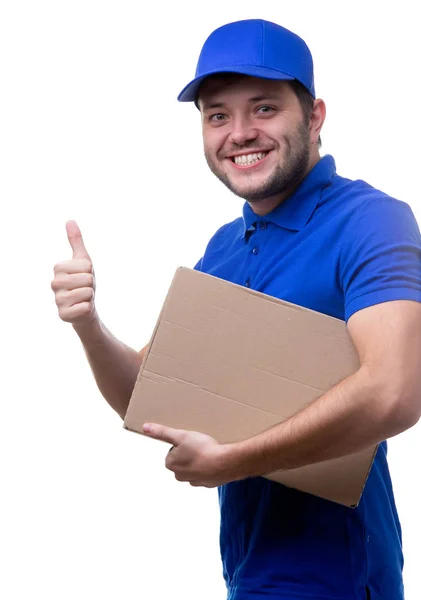 Photo of young man in blue T-shirt and baseball cap with cardboard box — Stock Photo, Image