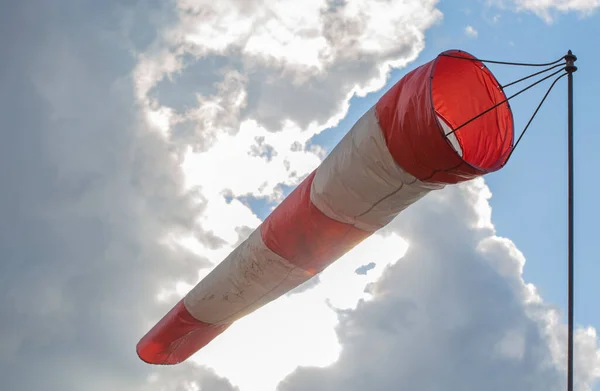 Windsock against the sky with clouds. Closeup. — Stock Photo, Image