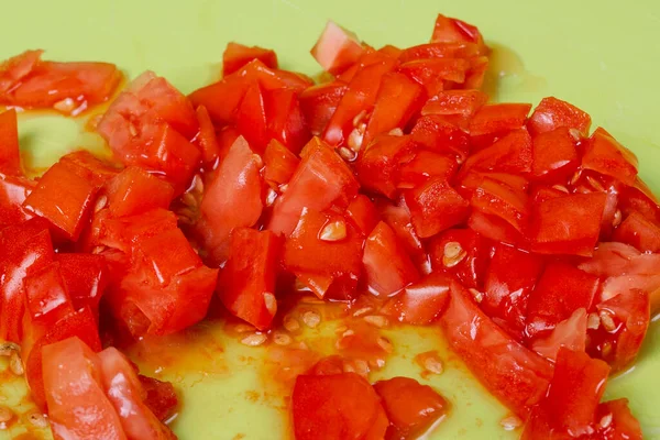 Chopped Red Tomatoes Leaked Juice Seeds Green Cutting Board — Stock Photo, Image