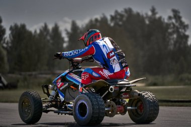 05-08-2020 Riga, Latvia: Unidentified quadrocycle rider training at racing track.