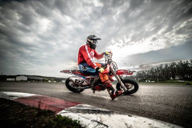 10-09-2020 Ropazi, Latvia Motorcyclist at sport bike rides by empty asphalt road. sport bike.