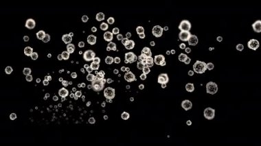 Siyah bir zeminde yüzen toz parçacıkları. 4K bilgisayar animasyonu.