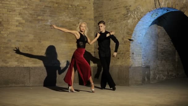 Two Young Beautiful Dancers Perform Tango Latin American Dances — Stock Video