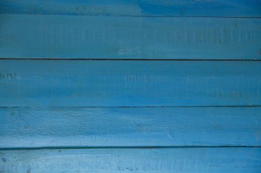 maviyle boyanmış yatay tahtaların arkaplanı