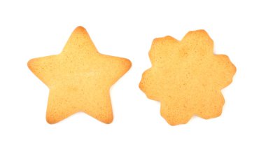 Beyaz arka planda izole edilmiş yıldız şeklinde Noel kurabiyesi. Noel ve yeni yıl için ziyafetler. Noel ağacı süslemesi