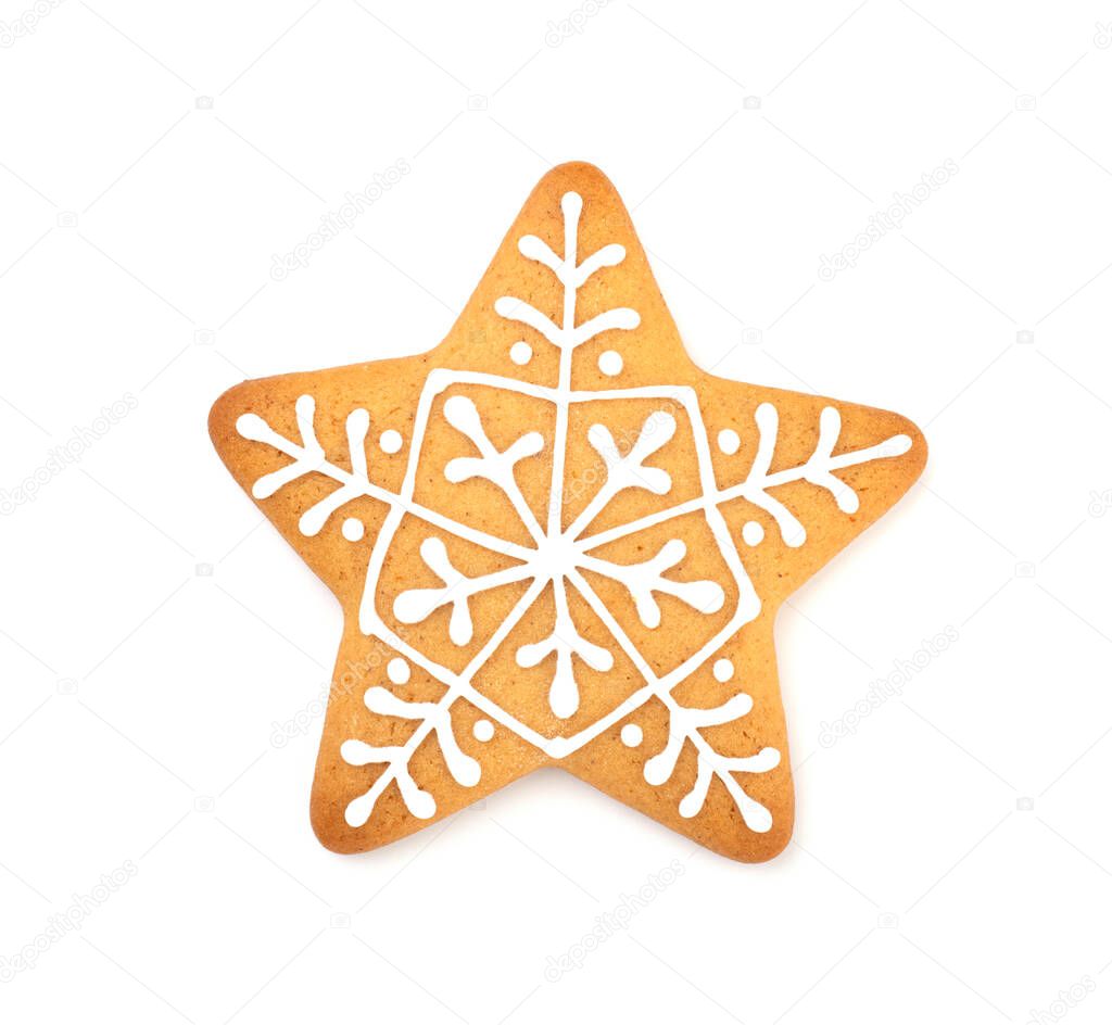 gingerbread star covered with icing isolated on a white background. festive treats for new year and Christmas
