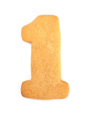 Beyaz arka planda bir numaralı zencefilli çörek. Yılbaşı kurabiyeleri