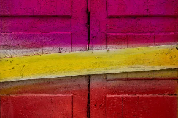 old pink door with door handle colorful
