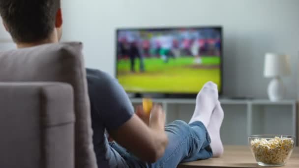 American football fan rejoicing at goal scored by favourite team, championship — Stock Video
