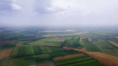 Uçak düşük irtifada, tarım ülke her bakıldığında birçok alanları ile arazi