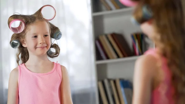 Little Daughter Hair Curlers Looking Mirror Wish Mother — Stock Photo, Image