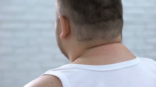 Obese male feeling neck ache stretching muscles, spinal sickness, health problem — Stock Video