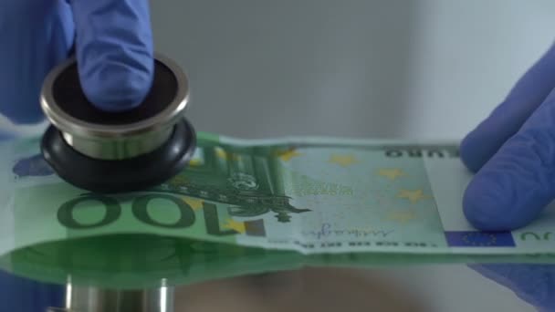 Diagnostyka euro z stetoskop, finansowe rynku koncepcja monitoringu — Wideo stockowe