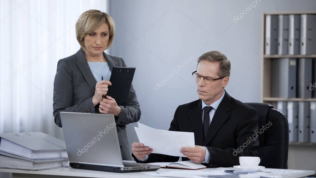 Subordinate office woman feeling uncomfortable at meeting with boss, wrong job