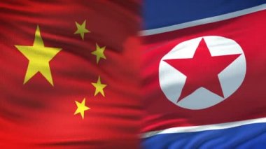 Çin ve Kuzey Kore el sıkışma Uluslararası dostluk Zirvesi bayrak arka plan