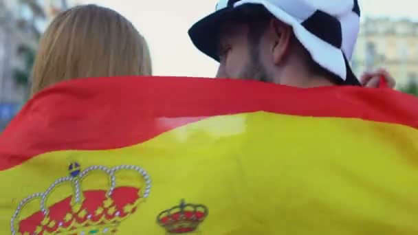 Spanish football team supporters actively jumping and chanting kissing in crowd — Stock Video