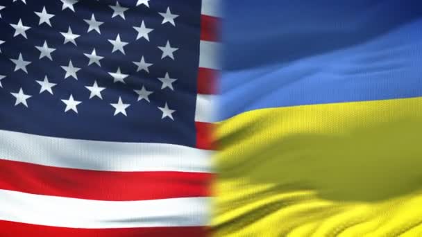 United States and Ukraine handshake, international friendship, flag background — Stock Video