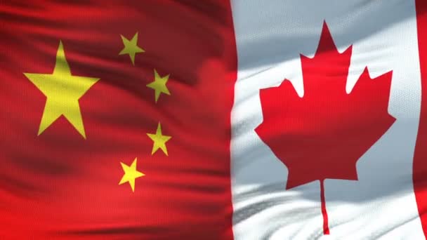 China en Canada handdruk, internationale vriendschap relaties, vlag achtergrond — Stockvideo