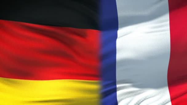 Deutschland und Frankreich Händedruck, internationale Freundschaftsbeziehungen Flagge Hintergrund — Stockvideo