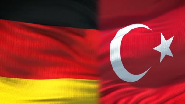Deutschland und Türkei Händedruck, internationale Freundschaftsbeziehungen Flagge Hintergrund — Stockvideo