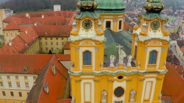 Old facade and roofs of Melk monastery in Austria, tourist attraction, aerial — Stock Video