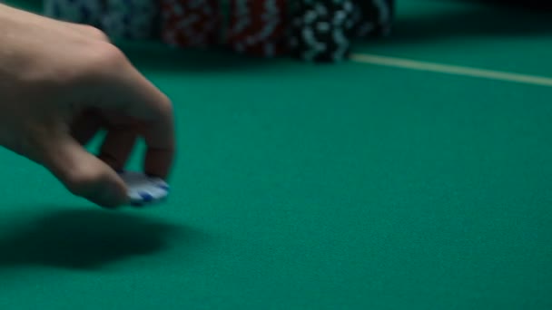 Croupier dealing cards, customer checking hands after making small bet, closeup — Stock Video