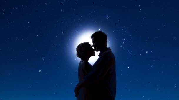 Couple meeting at night, gently embracing against starry sky and shining moon — Stock Video