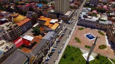 Famous Europe Square and bright rooftops of Batumi Georgia, cityscape aerial clipart