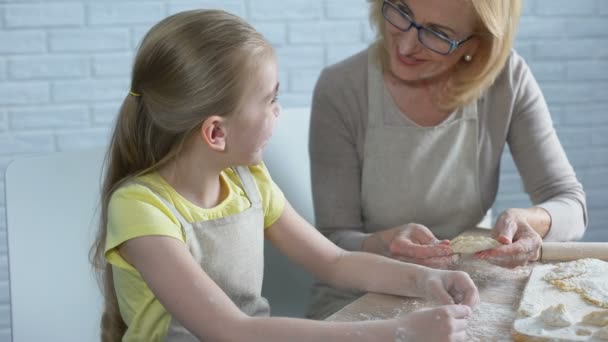 Pretty Female Preschooler Trying Cook Pastry Helping Her Granny Kitchen — Stock Video