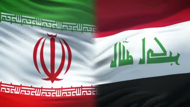 伊朗与伊拉克握手 国际友谊关系 旗帜背景 — 图库视频影像