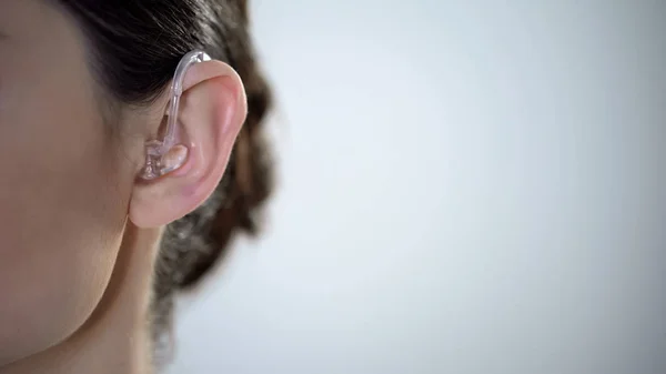 Closeup Ear Hearing Aid Young Deaf Woman Adjusting Environment — Stock Photo, Image
