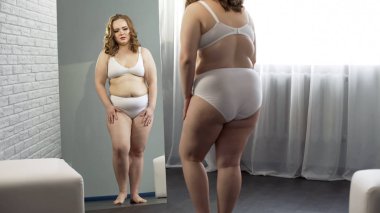 Kilolu sindirim bozukluğu obezite sorunu aynaya bakmak acı Bayan