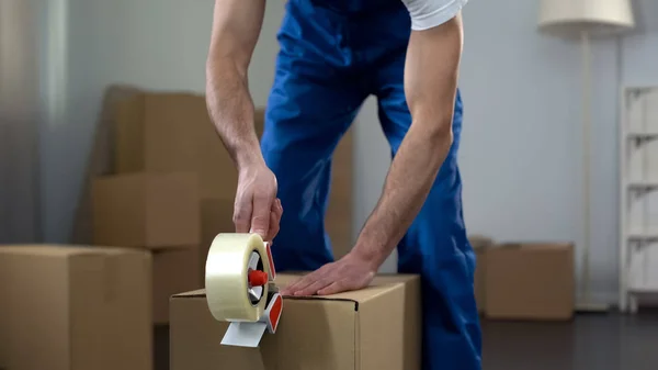 Moving Company Worker Packing Cardboard Boxes Quality Delivery Services — Stock Photo, Image