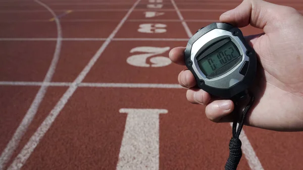 Man Holds Stopwatch Time Ten Seconds World Record Victory Competition — Stock Photo, Image