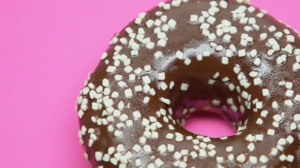 Spinning Chocolate Donut Pink Background Temptation Diet Junk Food — Stock Video