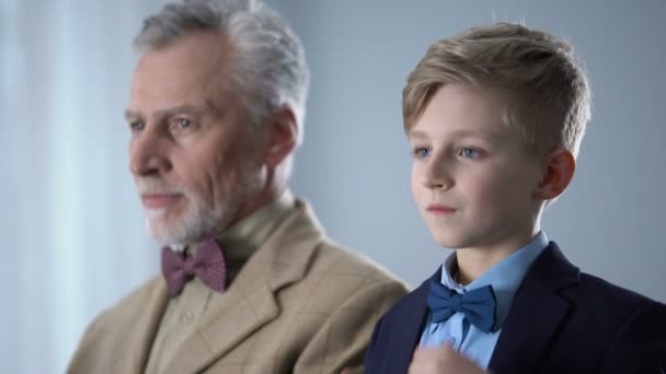 Senior Young Men Adjusting Bow Ties Looking Each Other Male — Stock Video
