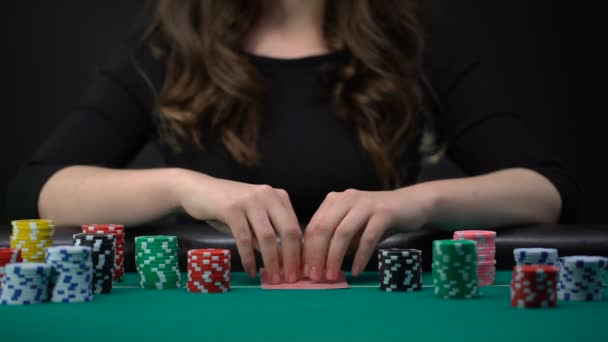 Woman Checking Cards Betting Casino Chips Risky Poker Tournament Gambling — Stock Video
