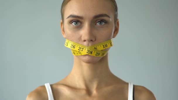 Woman Closed Mouth Tape Line Crossing Fork Knife Stop Diet — Stock Video