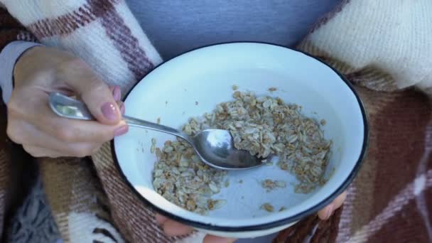 Pensive Woman Difficulty Eating Oatmeal Porridge Poor Social Protection — Stock Video