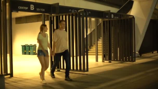 Couple Leaving Sector Football Stadium Walking Downstairs Night City — Stock Video