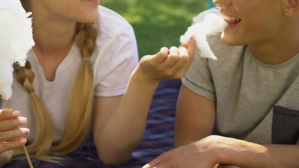 Teen Girl Feeding Guy Sweet Cotton Having Fun Together First — Stockvideo