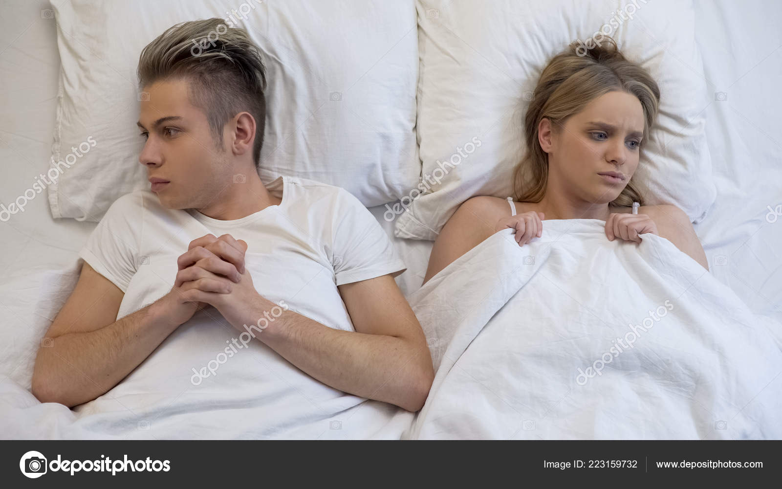 Shocked Couple Thinking First Intimate Experience Lack Sex Education Stock Photo by ©motortion 223159732