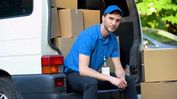 Tired Worker Moving Company Resting Sitting Van Full Cardboard Boxes — Stock Photo, Image